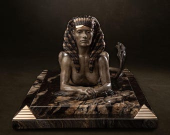 Escultura de bronze de esfinge