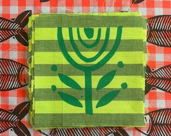 Green rainbow flower on green stripes