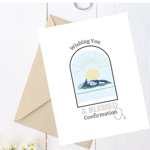 May include: A white card with a blue and green mountain scene with a yellow sun and the text "Wishing You A Blessed Confirmation" with a blue rosary charm.