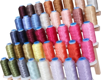 May include: A wooden thread rack with 4 tiers holding 48 spools of colorful embroidery thread. The spools are arranged in a pyramid shape and are all different colors, including pink, blue, green, yellow, orange, red, and brown.