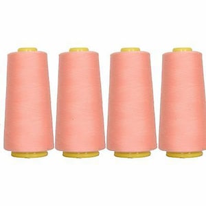May include: Four spools of peach-colored thread.