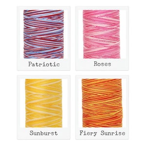 May include: Four spools of embroidery floss, each with a different color pattern. The spools are labeled "Patriotic", "Roses", "Sunburst", and "Fiery Sunrise".