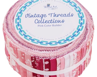 May include: A roll of pink fabric strips for quilting. The label reads "Thread Art, Vintage Threads Collections, Pink Color Builder, 40 Count, 120 Colors, 2.5 x 44 Strips".