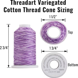 May include: A purple and white variegated cotton thread cone with a label that reads "100% Cotton Variegated Sewing Thread, Thread and Fabric Art Supplies Inc., 40S/3 Color No 2221, 600M". The cone is 2 3/4 inches tall and 1 3/4 inches wide.
