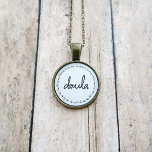 Doula Handcrafted Pendant Necklace - Silver, Antique Brass, or Copper