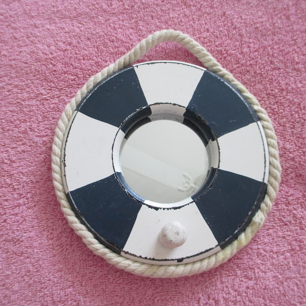 Nautical / beachy pealed paint  white and dark navy life preserver ring with bottom peg and  rope border mirror