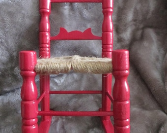 Vintage doll's red painted wood rocking chair with jute seat