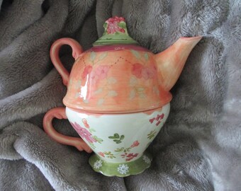 Tracy Porter Impatiens tea for one 3 piece hand painted teapot , teacup and lid in peachy coral ,light green , rose and cream