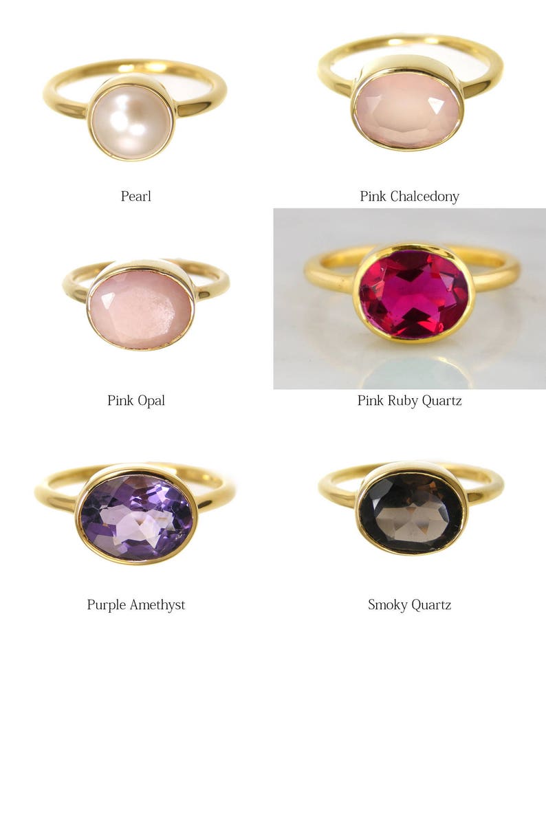 Puede incluir: Seis anillos de oro con diferentes piedras preciosas. Los anillos presentan una perla, una calcedonia rosa, una &oacute;palo rosa, un cuarzo rosa rub&iacute;, una amatista p&uacute;rpura y un cuarzo ahumado.