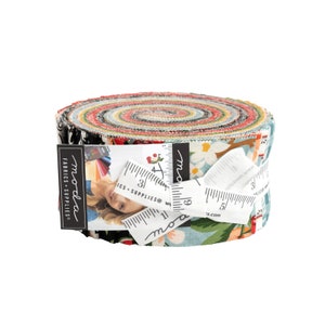May include: A roll of fabric featuring a variety of colorful prints with a floral theme. The fabric is rolled up and tied with a white ribbon. The label on the fabric roll reads "moda fabrics - supplies".