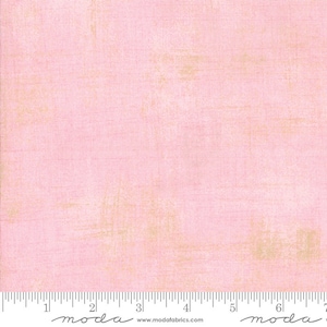 May include: A pale pink fabric with a subtle, textured, distressed look. The fabric has a slight sheen and a light, airy feel.