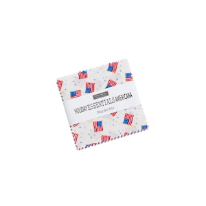 May include: A pack of fabric squares featuring a white background with red, white and blue American flags and blue stars. The label reads "Holiday Essentials Americana Stacy Iest Hsu".