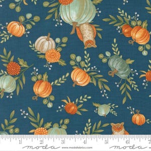 May include: A teal fabric with a repeating pattern of pumpkins in shades of orange, white, and green, interspersed with orange flowers, green leaves, and small white berries. An owl is also featured in the design. The fabric has the text "moda" at the bottom.