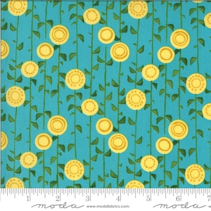 May include: A turquoise fabric with a repeating pattern of yellow stylized sunflowers on green stems. The fabric has a ruler with the word "moda" printed on it.