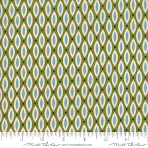 May include: A green fabric with a repeating pattern of blue and white teardrop shapes. The fabric has a subtle texture and a small black dot in the center of each teardrop shape.