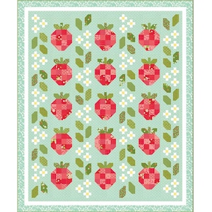 May include: A rectangular quilt featuring a repeating pattern of red patchwork strawberries on a light mint green background. The design includes vertical rows of white flowers and green leaves, framed by a white border and a patterned green edge.