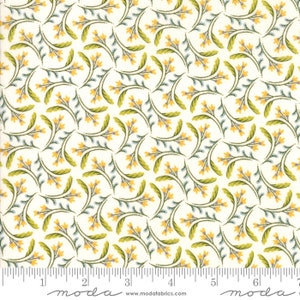 May include: White fabric with a repeating pattern of small yellow flowers and green leaves. The fabric has a subtle blue and gray color throughout. The fabric is marked with a ruler and the text "moda" in black.
