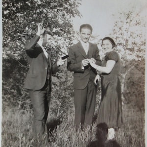 I Do - Young 1930's Couple Exchange Vows In Nature Snapshot Photo