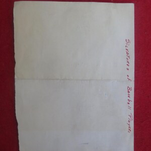 May include: A blank white sheet of paper with the text "Signatures of Baseball Players" written in red ink on the bottom right corner.