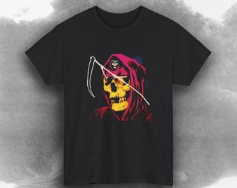 May include: Black t-shirt featuring a graphic of a Grim Reaper with a yellow skull, red hood, and a white scythe. The design has a vintage, pop art style. The shirt is a crew neck.
