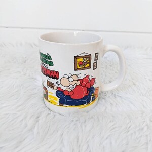 Vintage 1980s Cartoon Santa Coffee Mug Christmas Mug by Contenova Season's Greetings to a Real Sportsman Xmas Tree and Cats