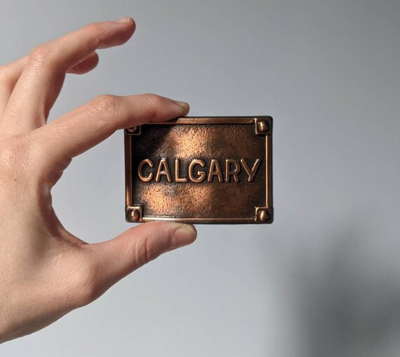 1970s Calgary Belt Buckle Embossed Copper Metal Buckl… Gem
