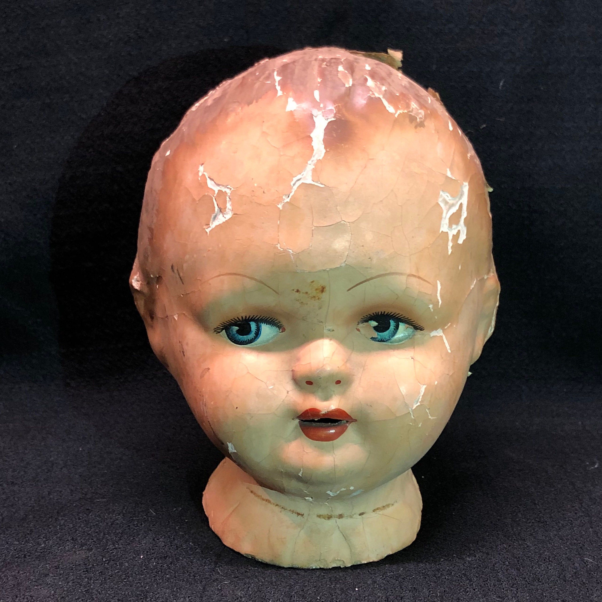 Paper mache doll heads on sale