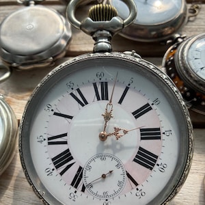 Railway pocket watch, large size, locomotive, steam train, silver, enamel, gold hands, late 19th century early 20th century
