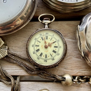 Pocket watch, silver, rose gold, landscape engraving, manual mechanical, antique, 19th century, Switzerland
