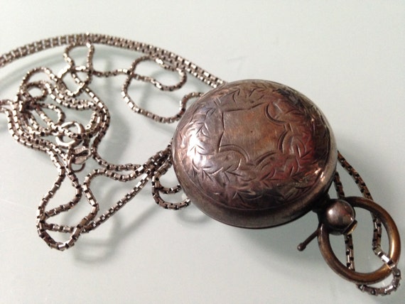 Antique coin holder best sale locket