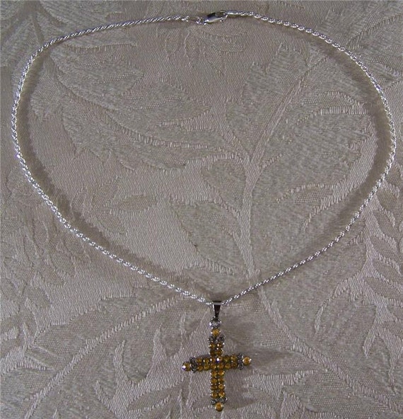 Cross Charm Oval with Inset Antiqued Cross Design Sterling Silver Cross Charm Oval with Inset Antiqued Cross Design Sterling Silver