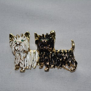 vintage gold tone dogs pin brooch of a black and white west highland terriers with green rhinestone eyes  **M5