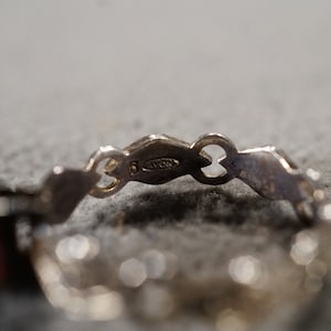 vintage sterling silver statement ring with teardrop shaped mysic topaz stone set in criss cross setting, size 7 1/2   **M5