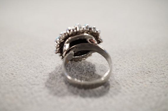 vintage silver tone Southwestern statement ring with bold floral star design of turquoise-colored inset beads, adjustable size 7  **M4