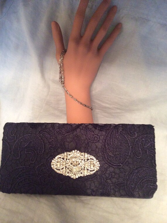 navy lace clutch bag