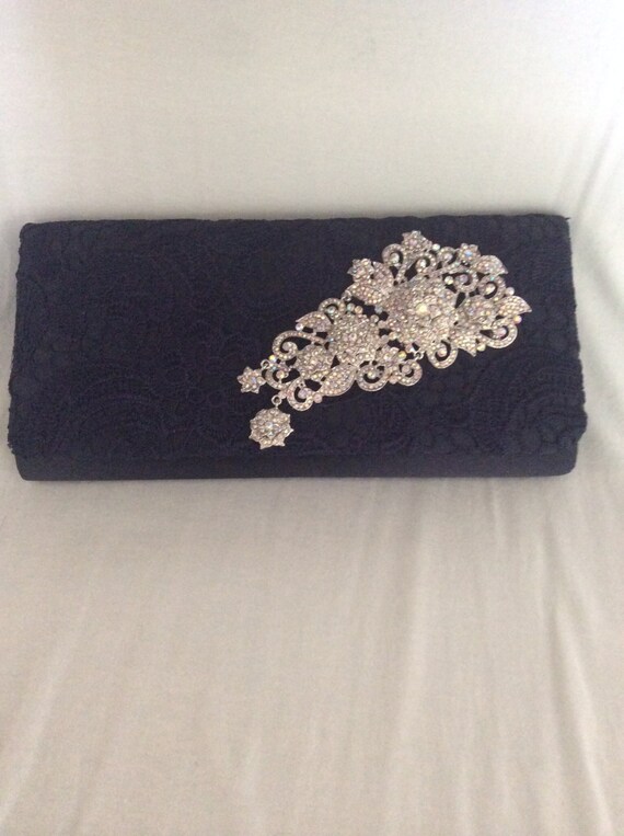 navy lace clutch bag