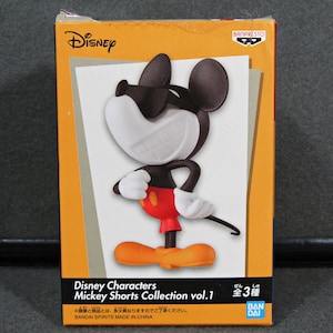 May include: A boxed Disney Mickey Mouse figurine from the Mickey Shorts Collection vol. 1. The figure is black, white, red, and orange, with Mickey in a confident pose. The box is orange with the Disney and Banpresto logos.