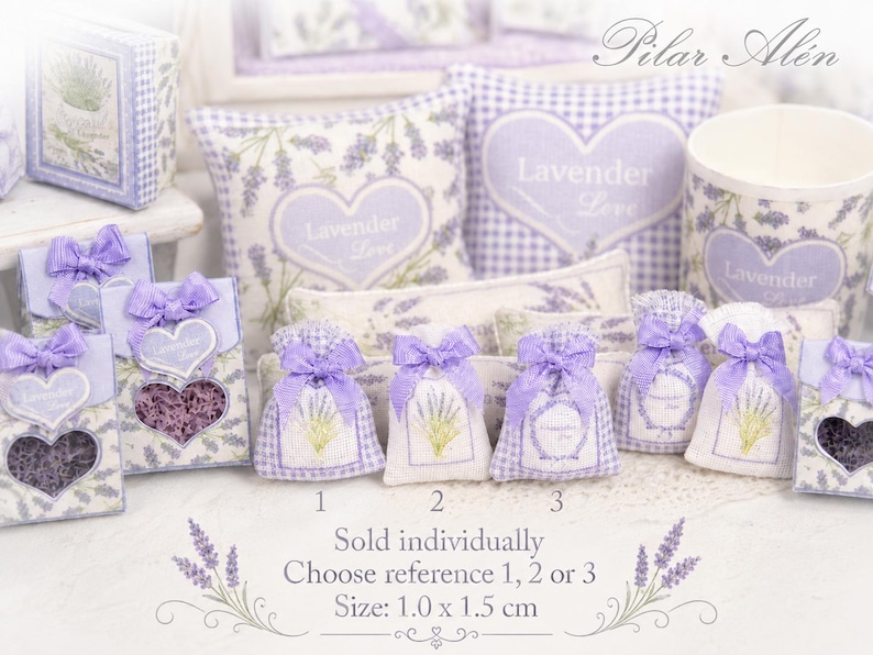 May include: A collection of miniature lavender-themed items including small fabric sachets, pillows, and boxes. The items feature purple lavender sprigs, heart motifs, and the text "Lavender Love". Some sachets are labeled 1, 2, or 3, with a size of 1.0 x 1.5 cm.