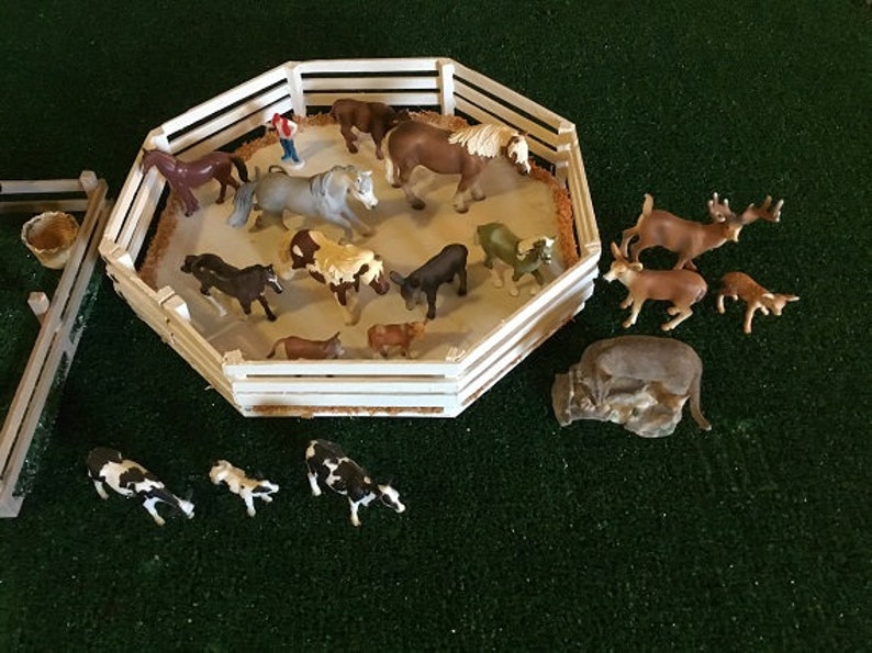 Model farm,ranch animals by Schleich,and wood corrals,scaled to 116 Ertl farm tractors