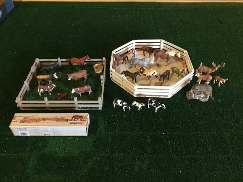 Model farm,ranch animals by Schleich,and wood corrals,scaled to 116 Ertl farm tractors
