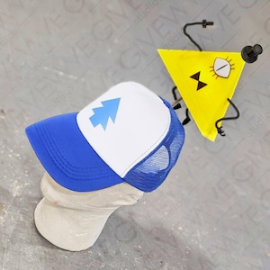 May include: A blue and white trucker hat with a pine tree design on the front. The hat is on a mannequin head. A yellow triangle with a single eye and a black top hat is in the background.