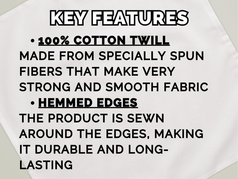 May include: White textile with black text detailing key features. The text highlights 100% cotton twill fabric made from specially spun fibers for strength and smoothness. It also mentions hemmed edges for durability.