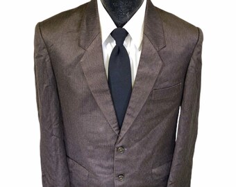 May include: A brown blazer with a subtle striped pattern. The blazer has a two-button closure and a single chest pocket.