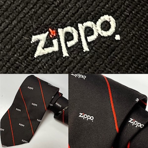 May include: Black and red striped tie with the word "Zippo" printed in white on the fabric.