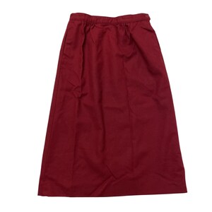 May include: A long, burgundy skirt with a simple design and a waistband.