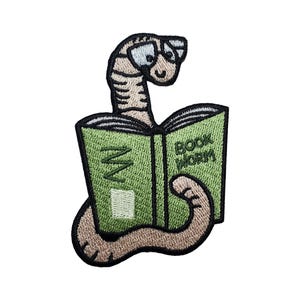 May include: An embroidered patch of a worm wearing glasses and reading a book. The book is green and has the words "Book Worm" on the cover.