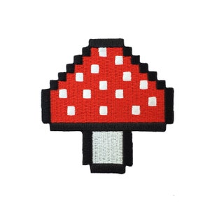 May include: A red and white pixelated mushroom with a white stem. The mushroom is a popular video game character.