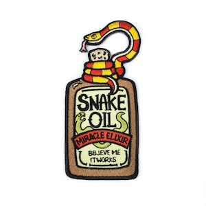 May include: A brown bottle with a yellow and red snake wrapped around it. The bottle is labeled "Snake Oils Miracle Elixir" and "Believe Me It Works".