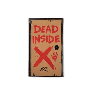 May include: A rectangular sign with the words "DEAD INSIDE" in red, a large red "X", and a black skull and bloody handprint. The sign has a brown background and a black border.