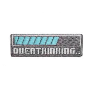 May include: A gray embroidered patch with a blue progress bar and the text "OVERTHINKING..."
